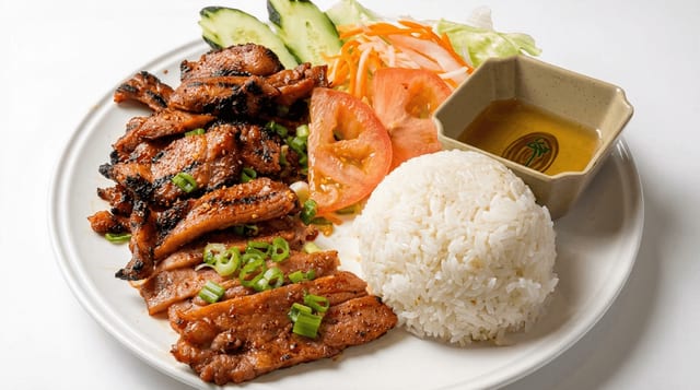 Charbroiled Pork & Chicken Rice Plate.